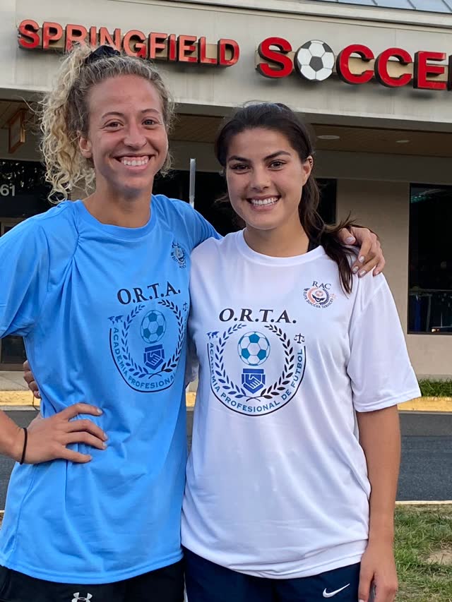 Annie Williams and Katie Pingel wearing O.R.T.A. Academy jerseys in Springfield, Virginia